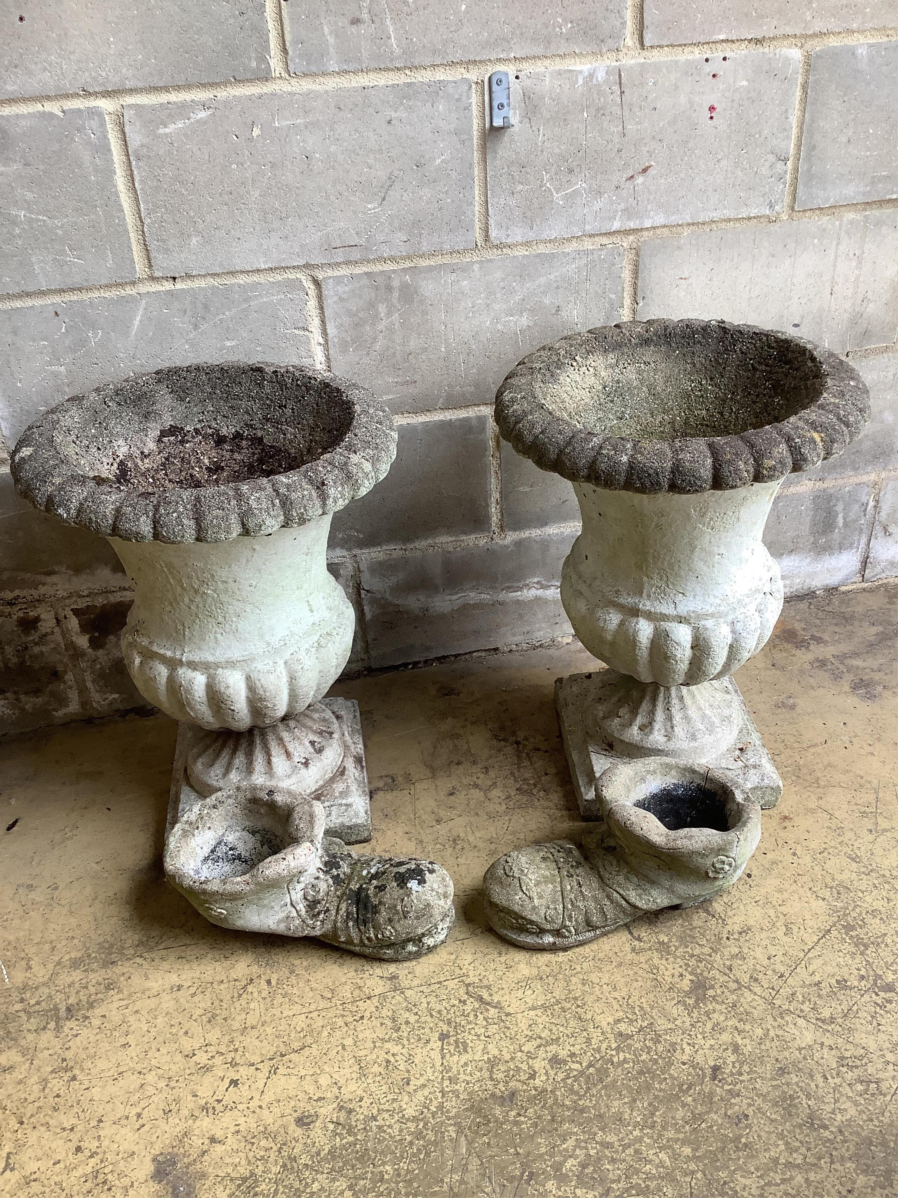 A pair of reconstituted stone campana garden urns, diameter 45cm, height 60cm together with a pair of reconstituted stone boot garden planters. Condition - good